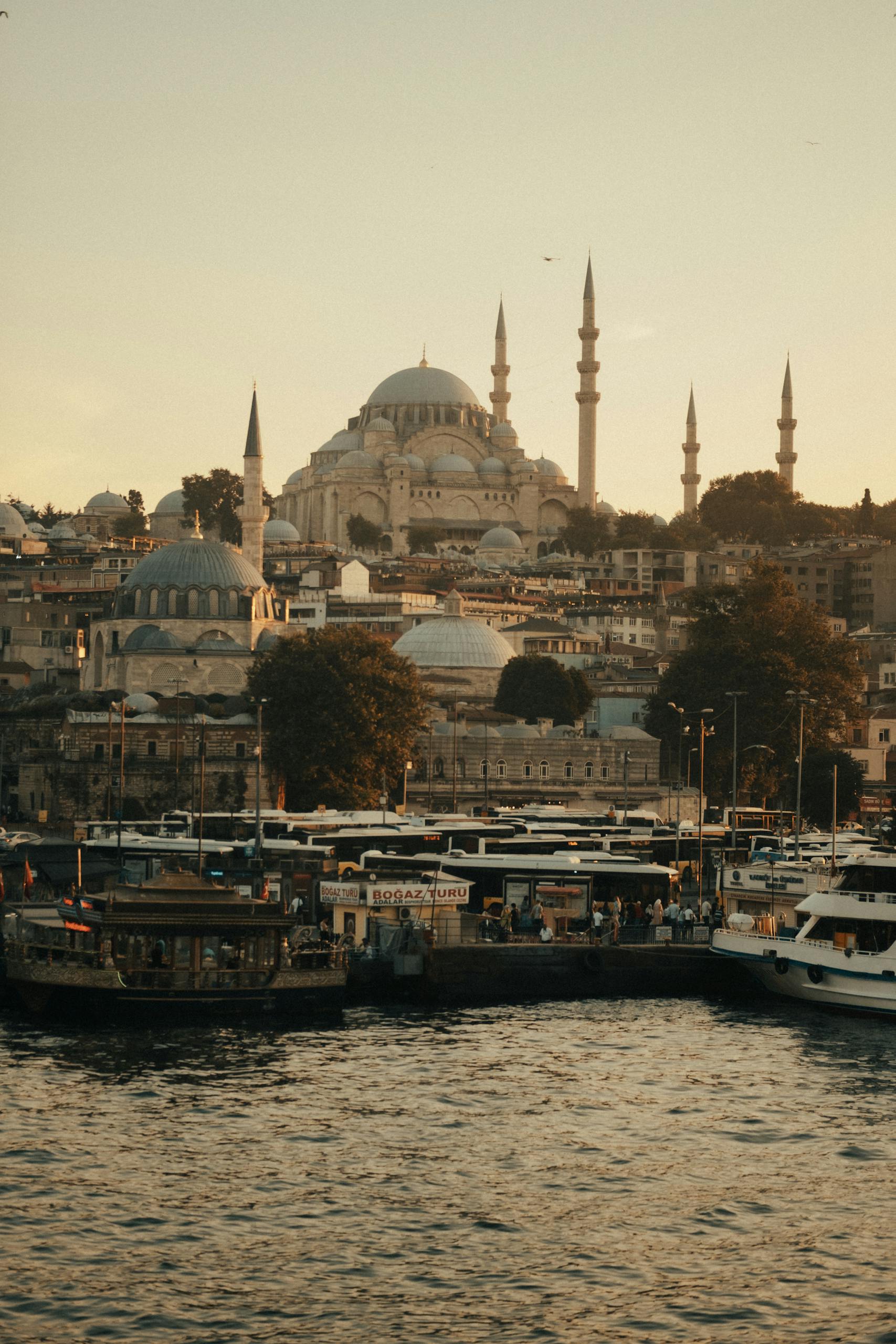 Stunning view of Suleymaniye Mosque in Istanbul during sunset across the Bosphorus.